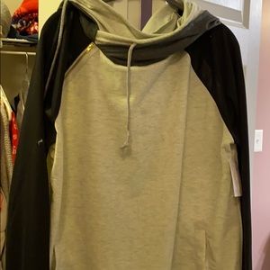 Hooded sweater with a zipper in the corner